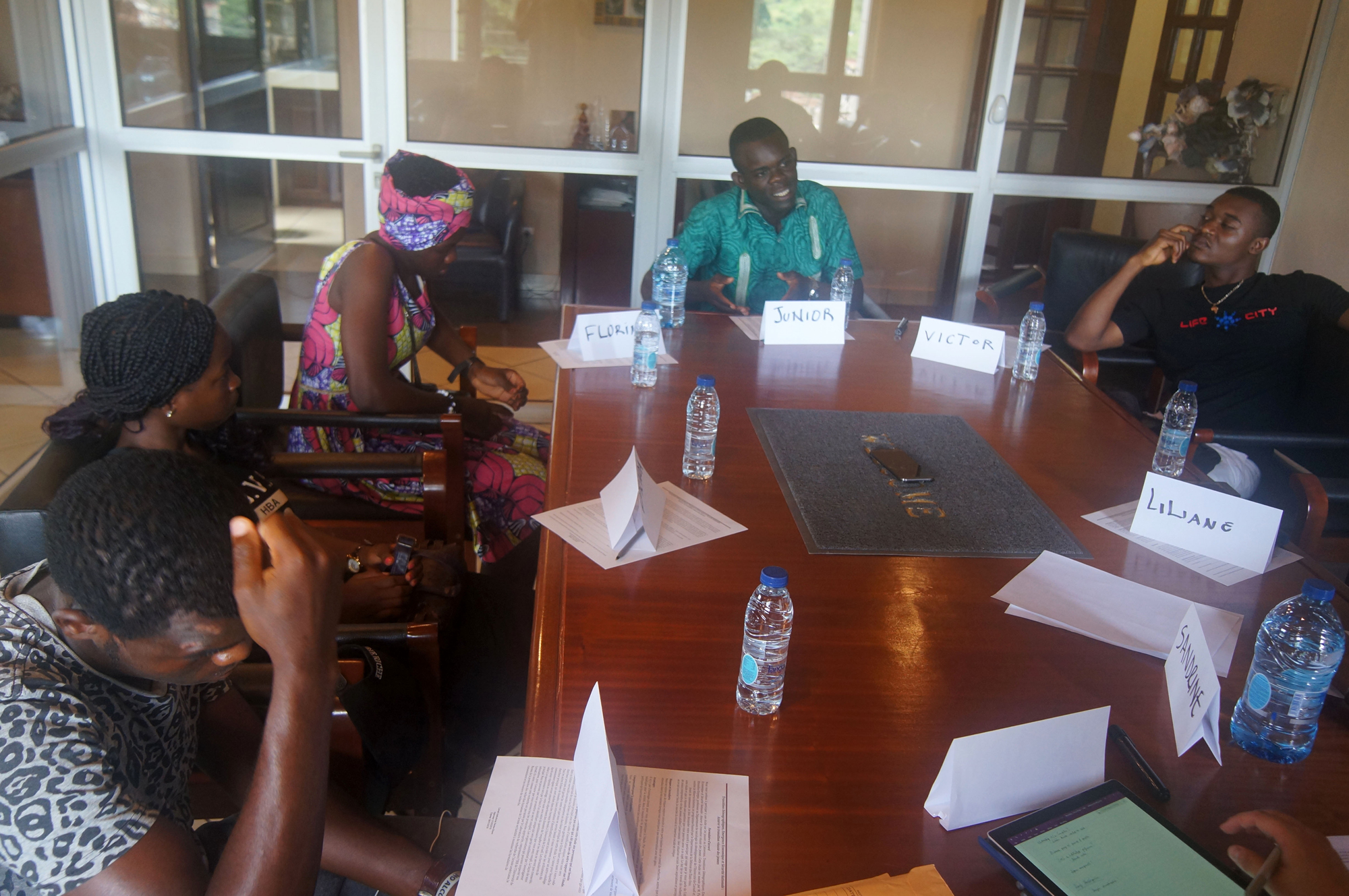 Young participants working together during a PICHNET training session.